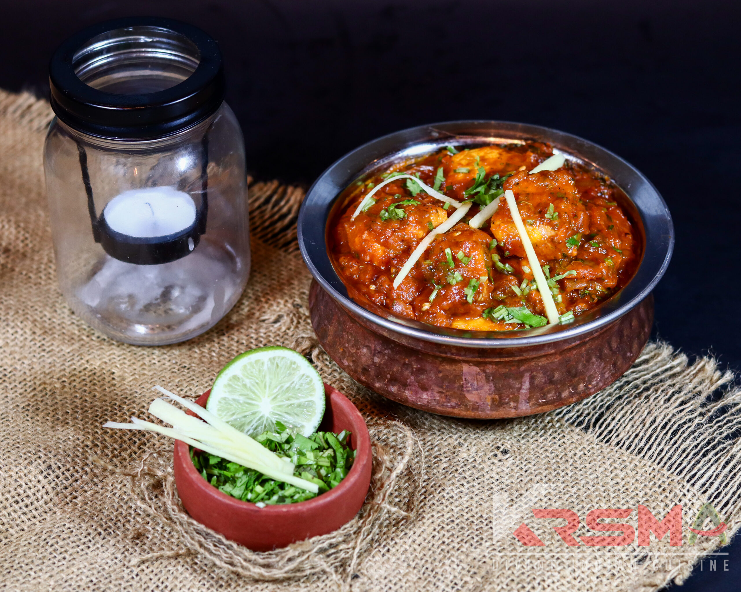 Bhuna Chicken - Tender chicken simmered in rich, spiced gravy, served fresh at Krsma Indian Cuisine, Vancouver's favorite Indian restaurant.