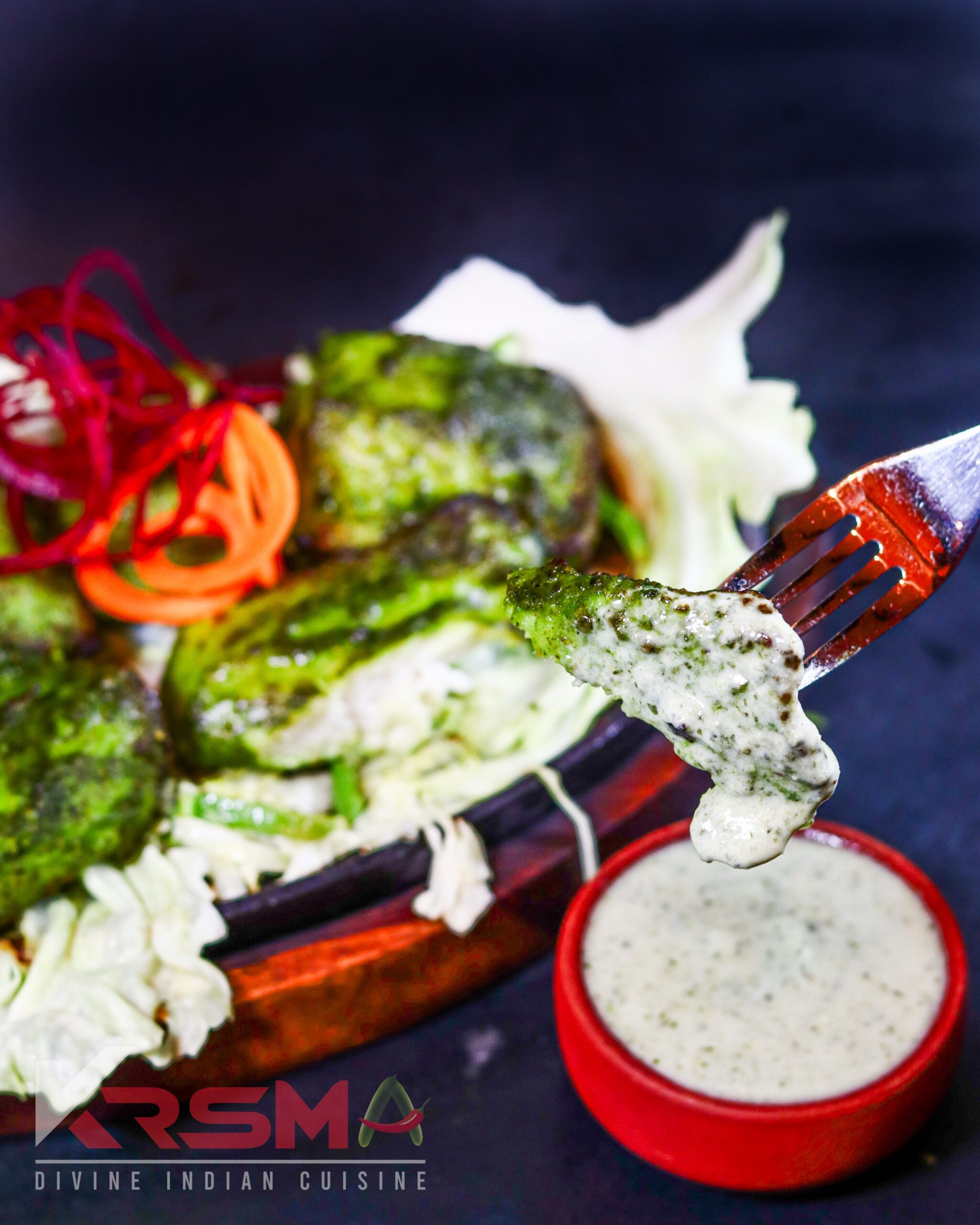 Hariyali Fish Tikka - Fresh fish marinated in a vibrant green herb mix and grilled to perfection, served at Krsma Indian Cuisine