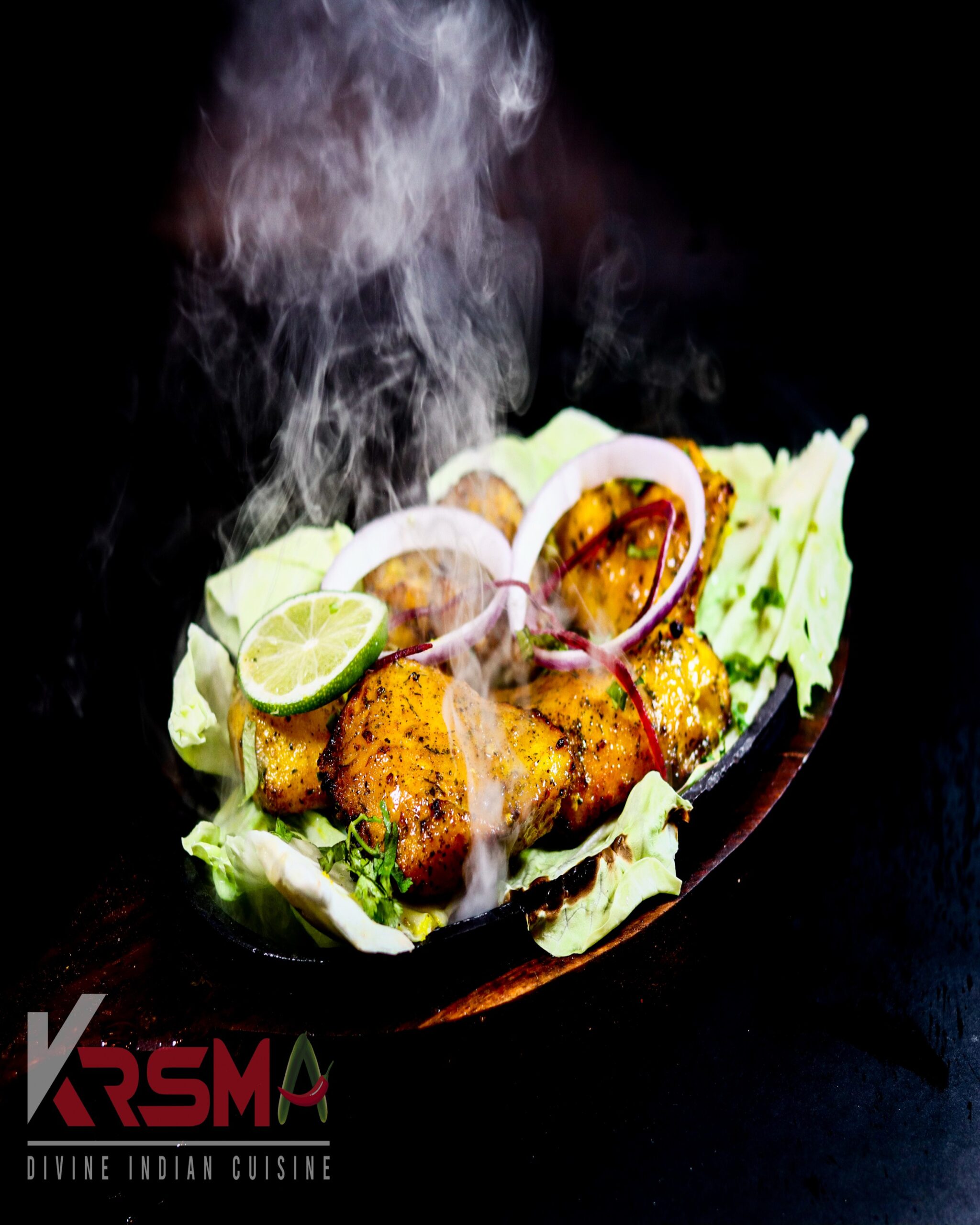 Kashmiri Fish Tikka - Tender fish marinated in Kashmiri spices and grilled to perfection, served fresh at Krsma Indian Cuisine