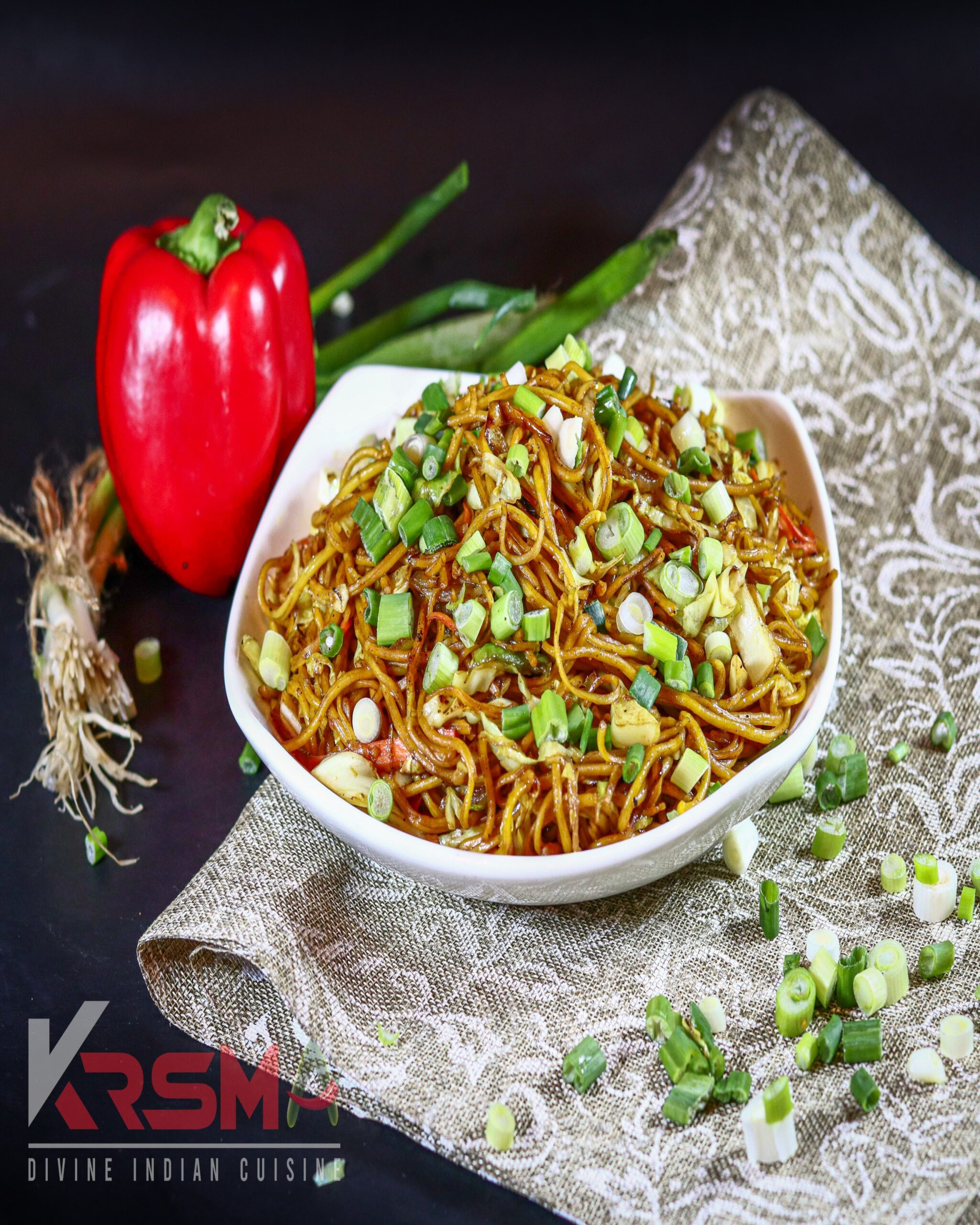 Veg Chow Mein - Flavorful stir-fried noodles with mixed vegetables and spices, served fresh at Krsma Indian Cuisine, Vancouver’s top Indian restaurant.