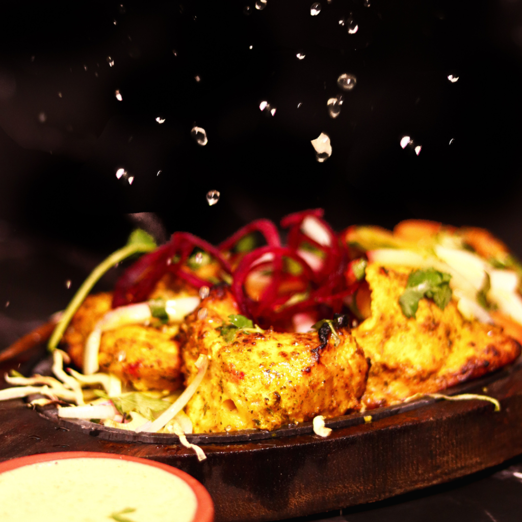 Chicken tikka with mint chutney and lime at KRSMA Indian Restaurant Vancouver